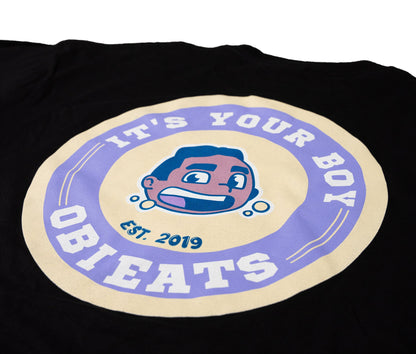 Black t-shirt with an It's Your Boy Obieats logo on a white background