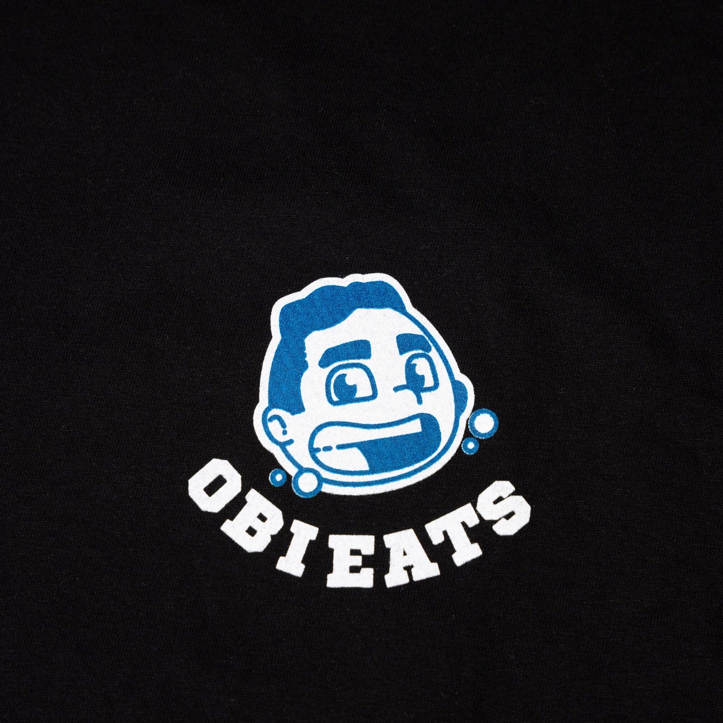 Logo of 'OBIEATS' with a stylized face on a black background